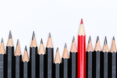 Red pencil among black represents custom coverage for partners